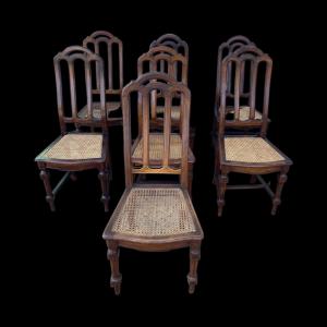 Seven Louis Philippe walnut chairs.