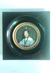 Miniatura con figura femminile.Cornice in legno ebanizzato.