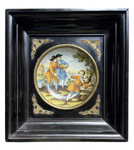 Majolica plate decorated with figures. Made in Castelli d’Abruzzo.
