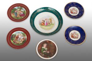 Lot of six polychrome porcelain plates from Vienna signed "A Kauffmann". Early 20th century period.