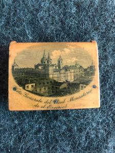 Wooden matchbox with a decoration depicting the Escorial Monastery in Madrid, Spain.