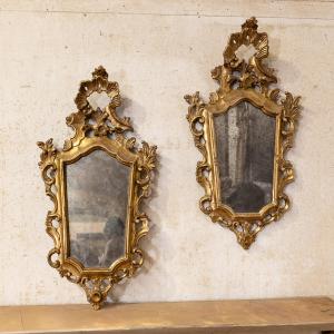 Coppia di piccole specchiere a ventola