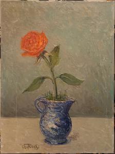 Rote Rose in blauer Vase
