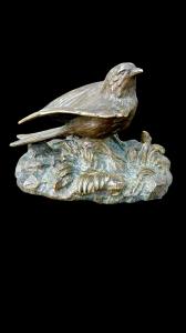 Sculturina in bronzo raffigurante un uccellino